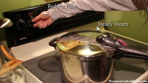 Pressure cooker releasing steady steam